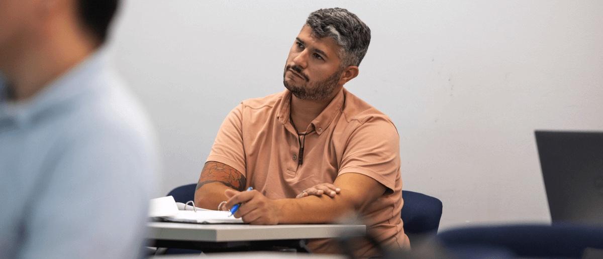 Student in a Barney graduate classroom